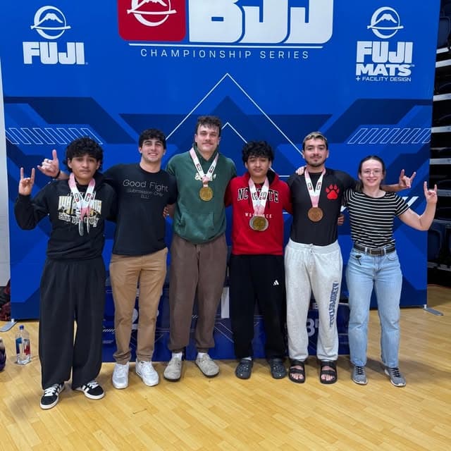 Club competitors with medals at a Fuji BJJ tournament