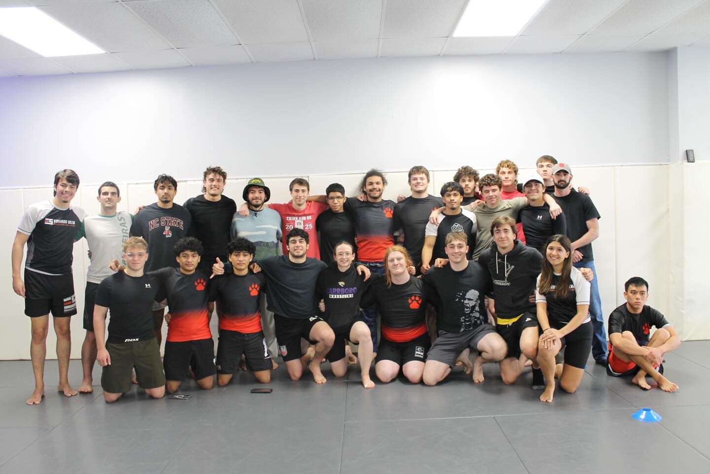 NC State Grappling Club members together on the mats after a collegiate tournament